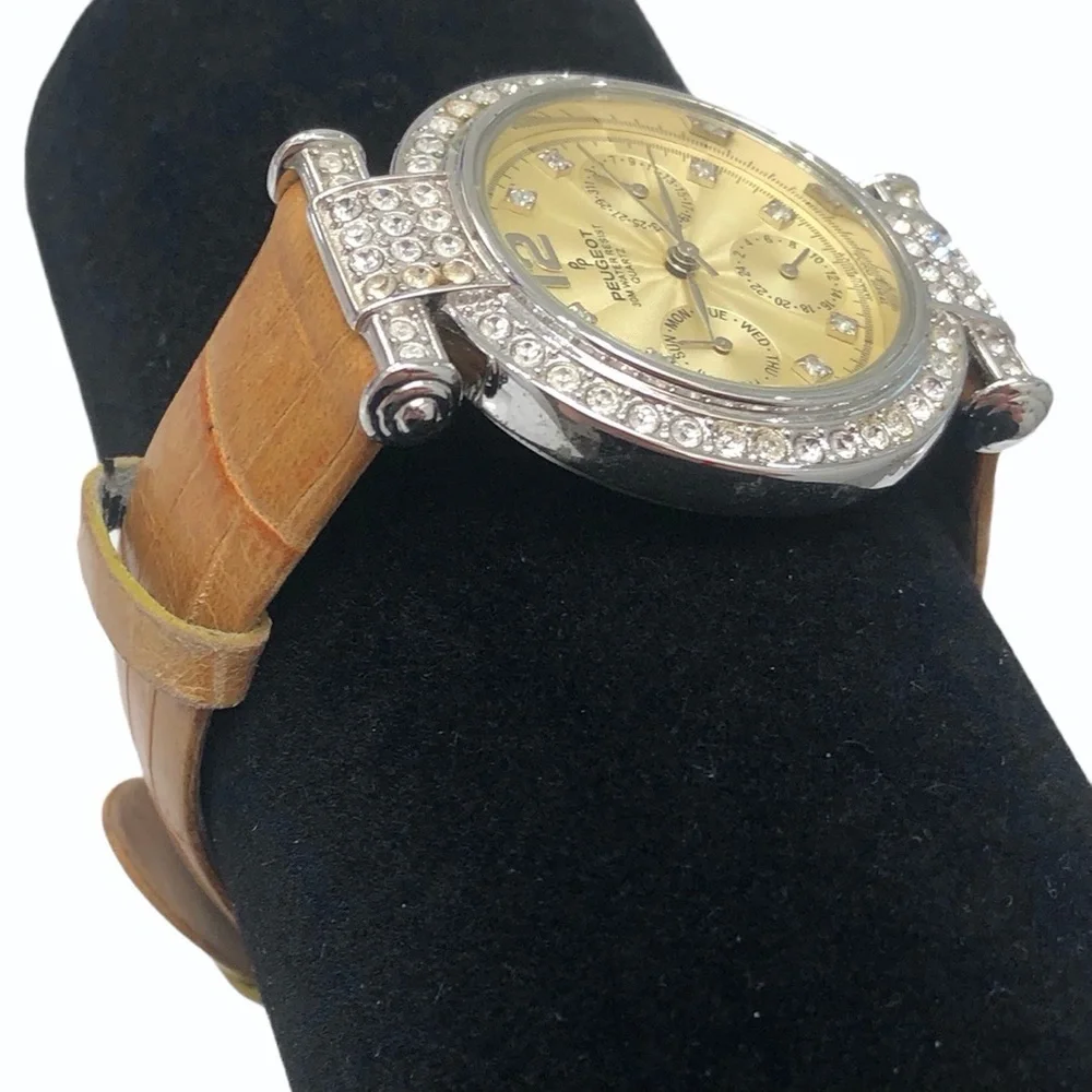 P. PEUGEOT YELLOW FACE & CROCODILE STAMPED BAND WITH CRYSTAL BEZEL WATCH